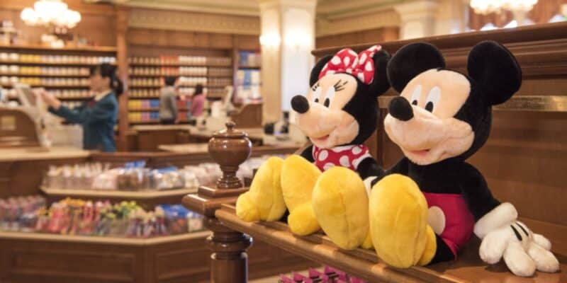 Minnie and Mickey Mouse plush toys on a shelf at Disney