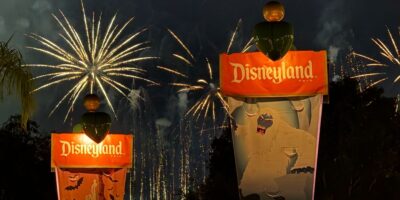 Fireworks above Disneyland banners.