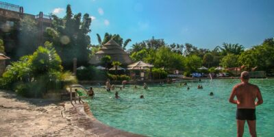 Guests enjoying the pool at Disney's Animal Kingdom Lodge.
