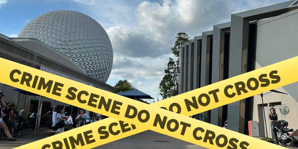Bright yellow "Crime Scene Do Not Cross" tape stretches in front of Spaceship Earth at EPCOT.
