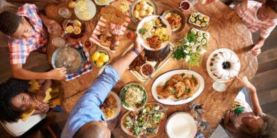Guests gather around a cozy table brimming with brunch favorites at Homecomin’ Disney Springs for Brunchmas on December 20.