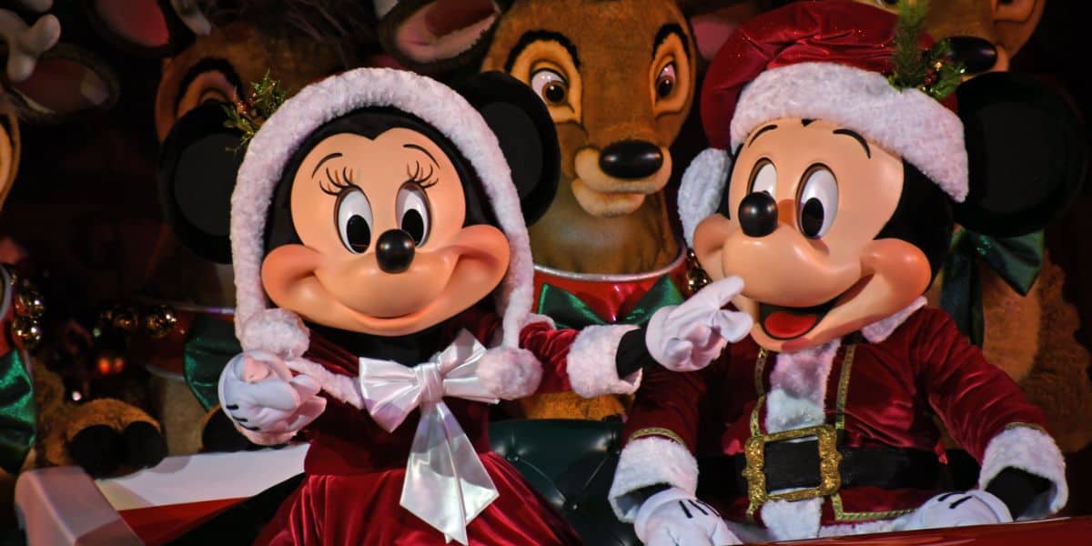 Minnie and Mickey Mouse in the Once Upon A Christmastime Parade.