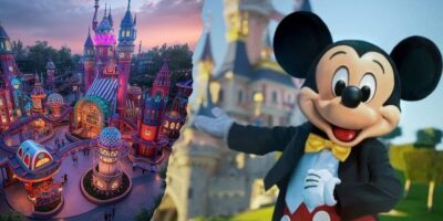 A Disney park bursting with color at sunset, Mickey Mouse greets guests with a big smile and friendly wave under the glowing sky as a 3D printed theme park attraction sits to the left of the image.