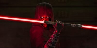 Darth Maul wields his double-bladed red lightsaber