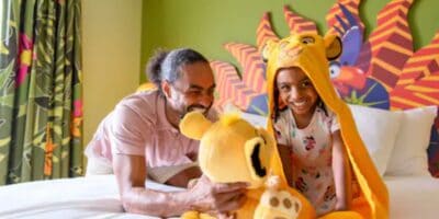 Disney World hotel guests in a Lion-King-themed room