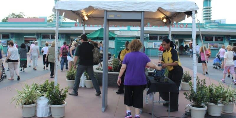 Disney Park guests going through a security checkpoint at Disney's Hollywood Studios