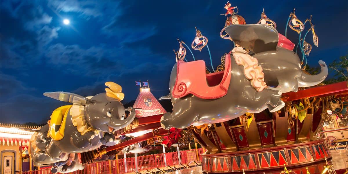 Guests ride Dumbo at night at Shanghai Disneyland