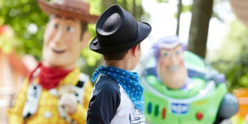 A young guest meets Woody and Buzz Lightyear at Walt Disney Studios Park