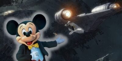 Mickey Mouse excitedly poses before the Millennium Falcon soaring through a dramatic space backdrop at Disney World. Millennium Falcon: Smugglers Run update Disney World