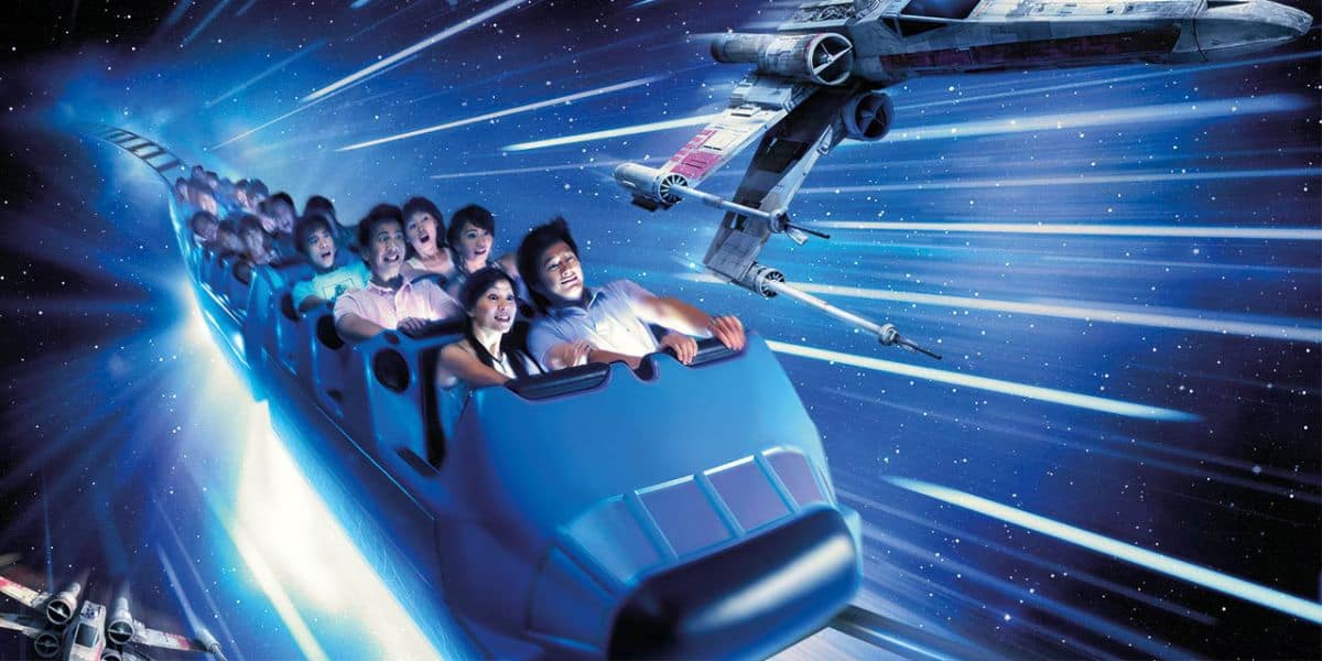 Guests ride Hyperspace Mountain at Hong Kong Disneyland