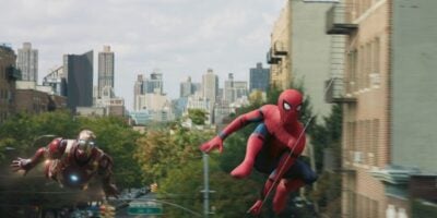 Iron Man (RDJ) flying after Spider-Man (Tom Holland) in Spider-Man: Homecoming MCU film