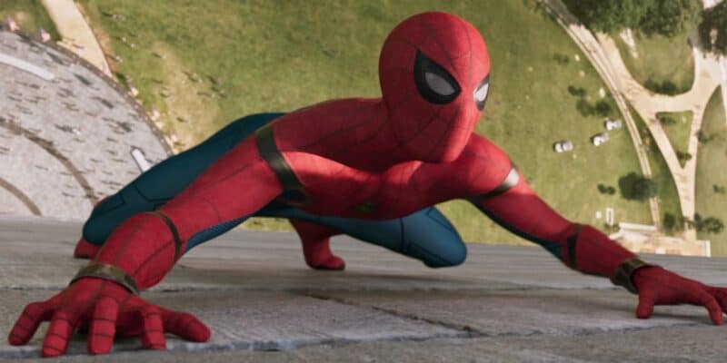 Tom Holland as Spider-Man scaling a wall in 'Spider-Man: Homecoming' MCU film