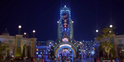 Universal's Epic Universe entrance lit up at night