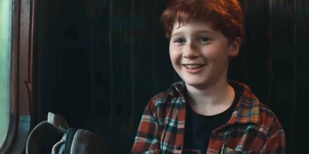 Ron smiling on the Hogwarts Express in HBO's 'Harry Potter'