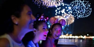 Guests watching Disney fireworks