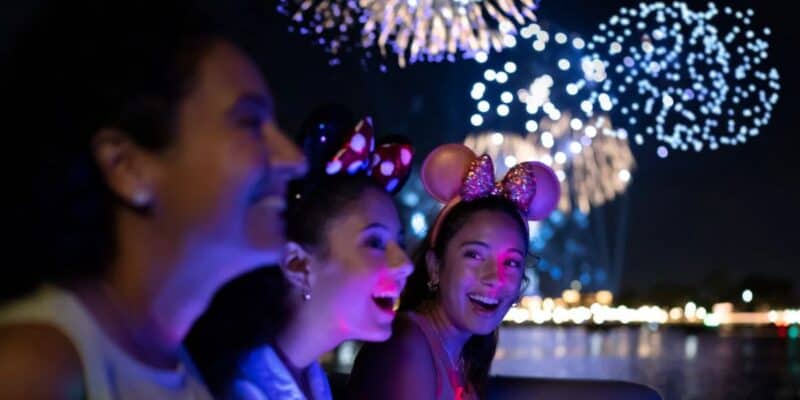 Guests watching Disney fireworks