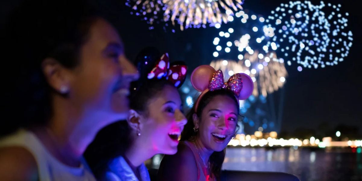 Guests watching Disney fireworks