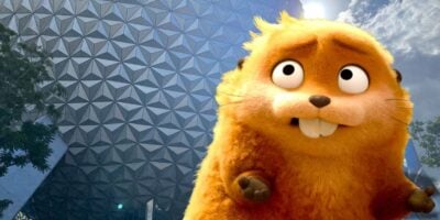 A character from 'Hoppers' edited in front of Spaceship Earth at EPCOT.