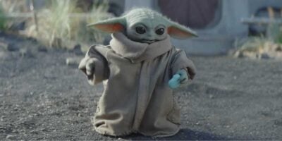 Grogu eating a cookie in 'The Mandalorian and Grogu'