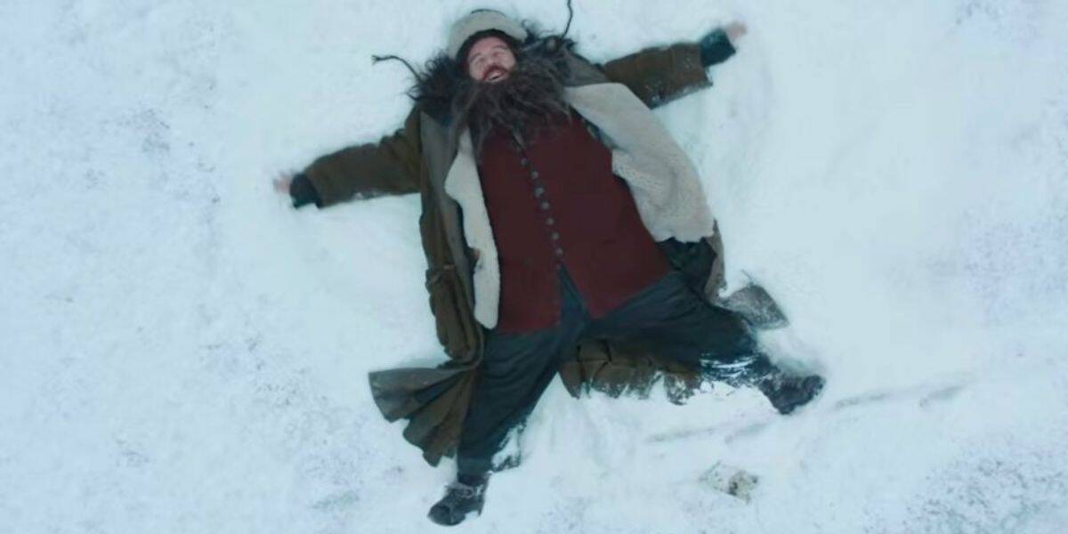 Nick Frost as Hagrid doing snow angels