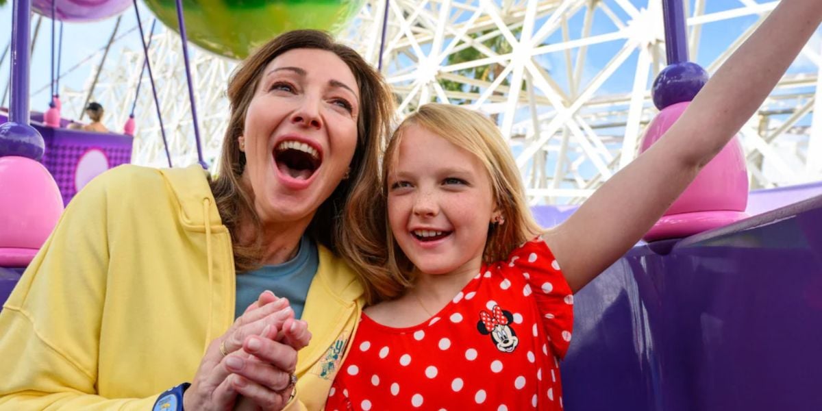 two guests on the Inside Out Emotional Whirlwind ride at Disney California Adventure Park