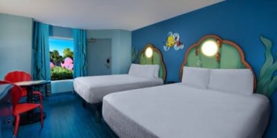 Smartphone displaying My Disney Experience hotel room request options at Walt Disney World Resort.