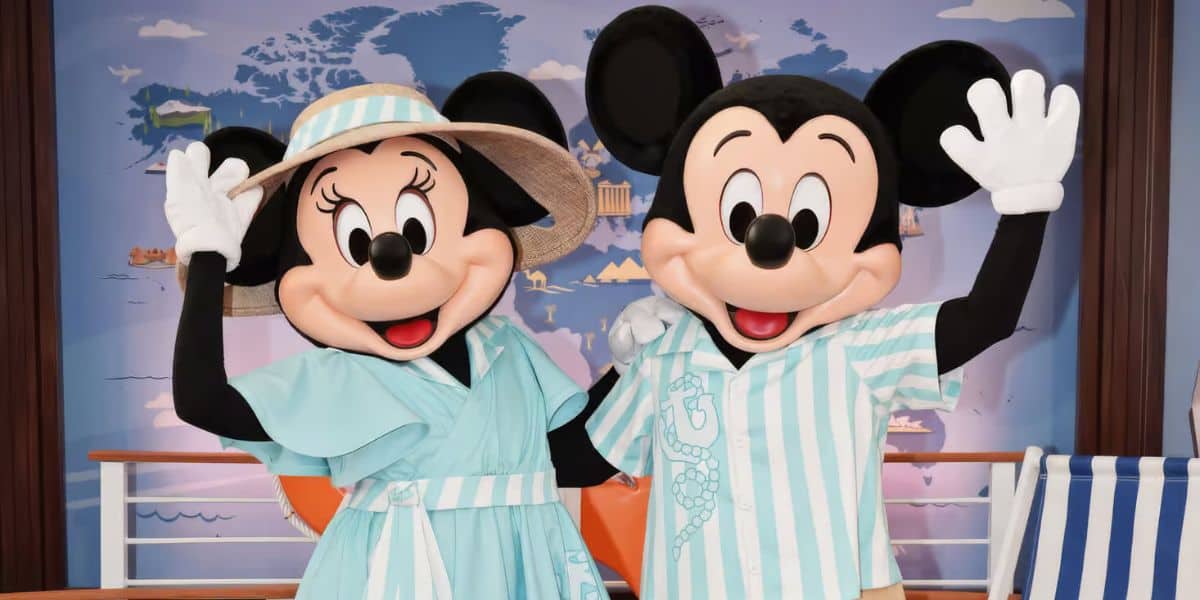 Mickey and Minnie Mouse in their new, EPCOT Disney Vacation Club lounge exclusive looks.