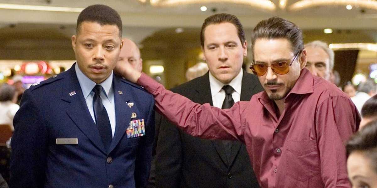 L-R: Rhodey (Terrence Howard), Happy (Jon Favreau), and Tony Stark (Robert Downey Jr.) in 'Iron Man'