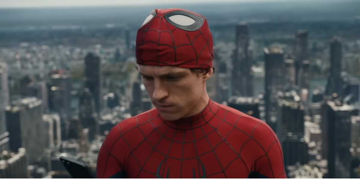 Peter Parker (Tom Holland) unmasked with New York in the background