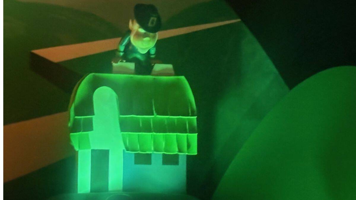 Broken 'it's a small world' figure