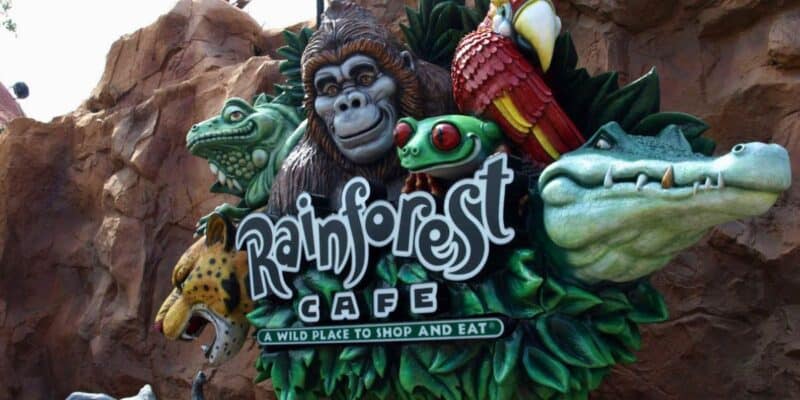 Rainforest Cafe sign at Disney Resort with animal mascots—gorilla, parrot, frog, leopard, alligator—a cherished lost icon. Disneyland Paris Rainforest Cafe