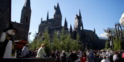 Guests in front of Hogwarts Castle at Universal Orlando Resort