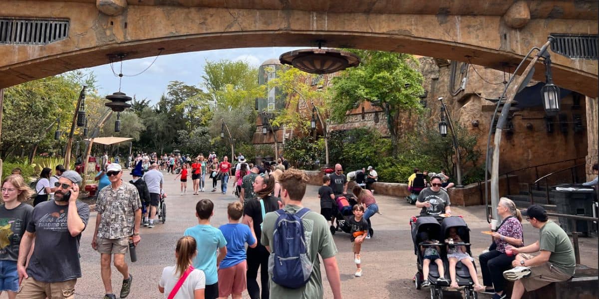 Guests walking under in arch in Star Wars: Galaxy's Edge at Disney's Hollywood Studios