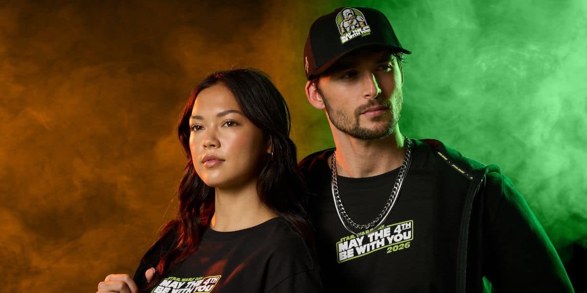 Man and woman in 'Star Wars' merchandise