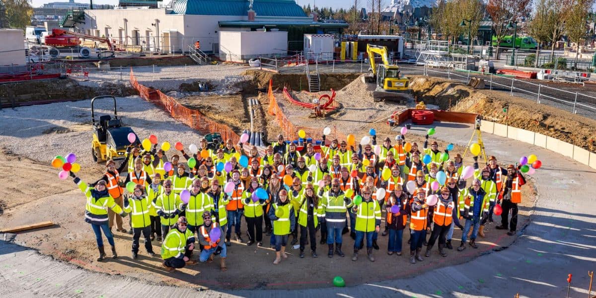 Imagineers celebrate at the 'Up' ride site with balloons