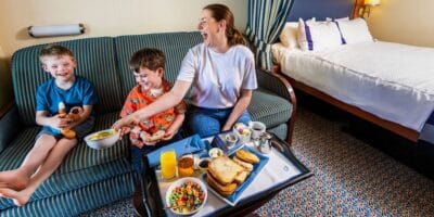 Guests having room service in a stateroom on the Disney Cruise Line