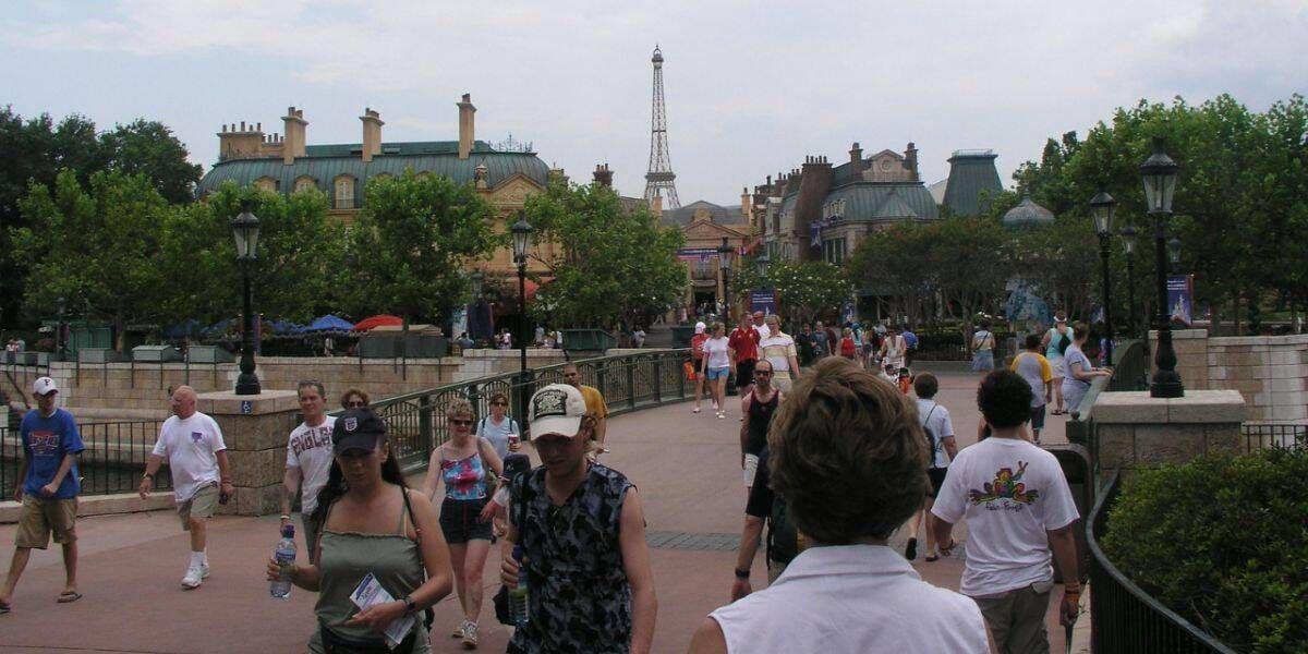 Guests walking toward the France World Showcase Pavilion at EPCOT