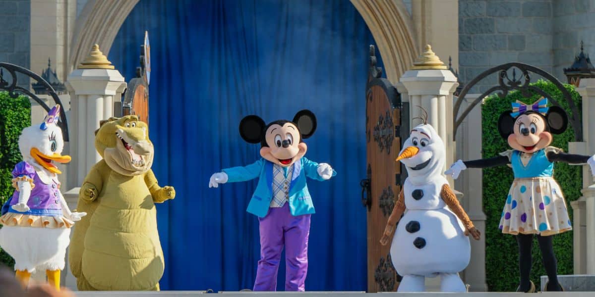Characters onstage during Mickey's Magical Friendship Faire on the Cinderella Castle Stage at Magic Kingdom