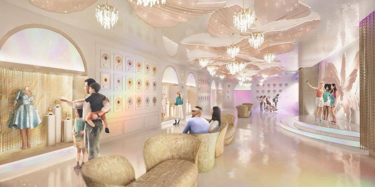 Upscale park entrance lobby with plush benches, sparkling chandeliers, and guests checking out interactive attraction previews.