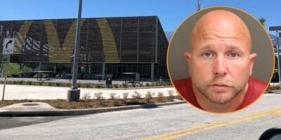 A mugshot of Gavin Blakely Jones picture in front of the McDonald's at Walt Disney World Resort