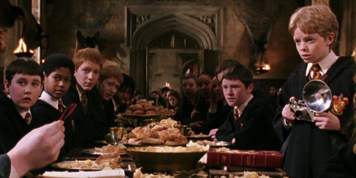 Colin Creevey at the Gryffindor table in the Great Hall