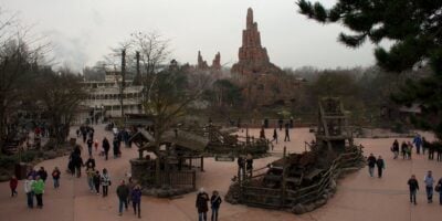A view of the Molly Brown riverboat and Big Thunder Mountain Railroad in Frontierland at Disneyland Paris