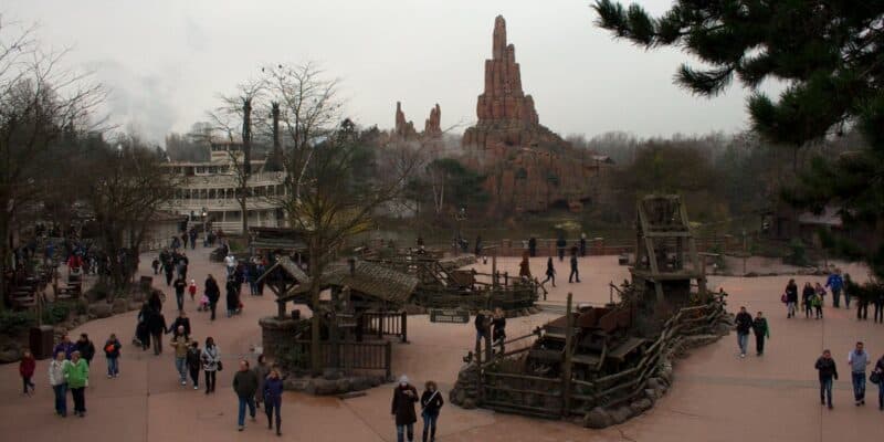 A view of the Molly Brown riverboat and Big Thunder Mountain Railroad in Frontierland at Disneyland Paris