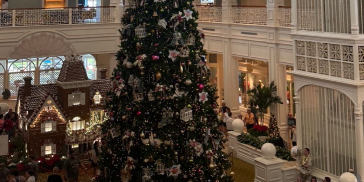 The Christmas tree and gingerbread house in the lobby at Disney's Grand Floridian Resort & Spa