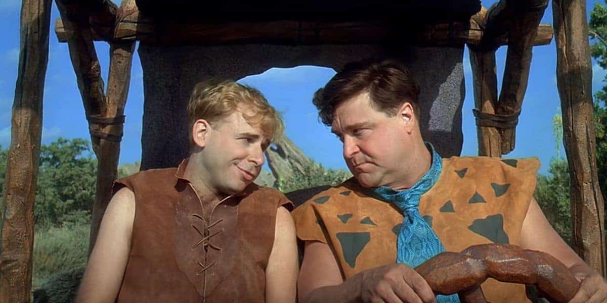 Barney and Fred driving in 'The Flintstones' movie