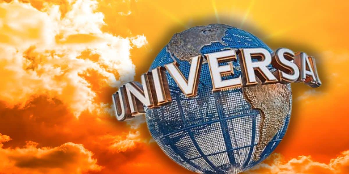 The Universal Studios globe welcomes guests, standing tall beneath a vibrant orange and yellow sky at the park entrance. Universal Orlando heat wave