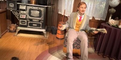 John Progress filmed after a guest climbed onto the Carousel of Progress stage