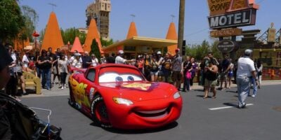 Lightning McQueen in front of the Cozy Cone Motel in Cars Land at Disney California Adventure Park.