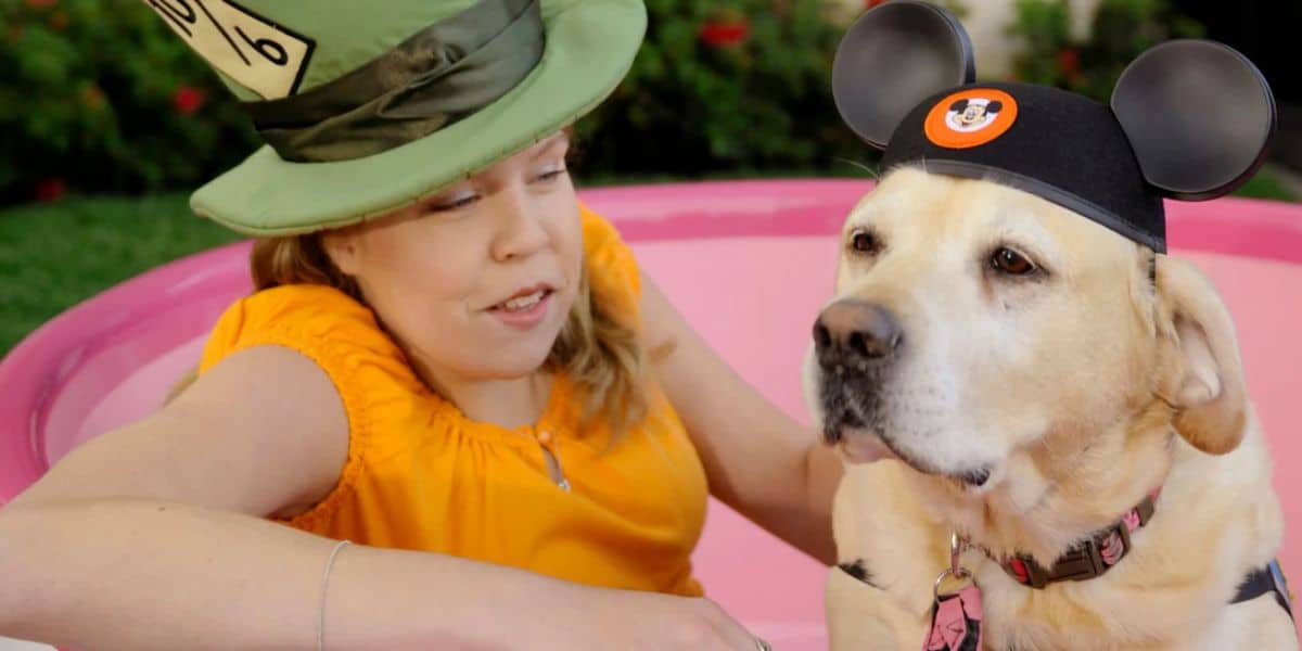 Guest with a dog in a teacup at Disneyland