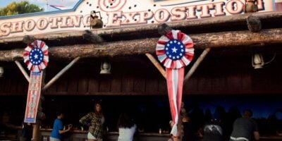 Guests at the Frontierland Shootin' Exposition at Disneyland Park